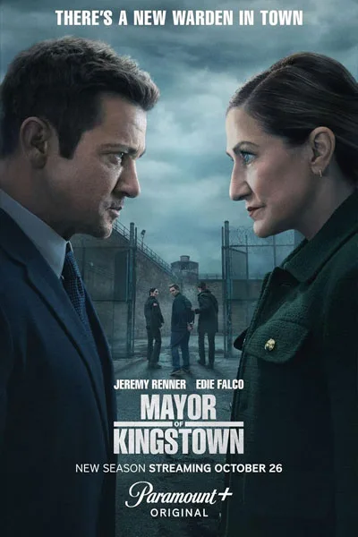 Poster for Mayor of Kingstown: a man and a woman face off with a prison yard behind them; tagline 'There’s a new warden in town'.
