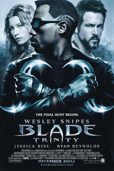 Blade Trinity movie poster: central muscular man in a black suit with glowing blade motifs across the chest, flanked by a woman and a man, blue-tinted.