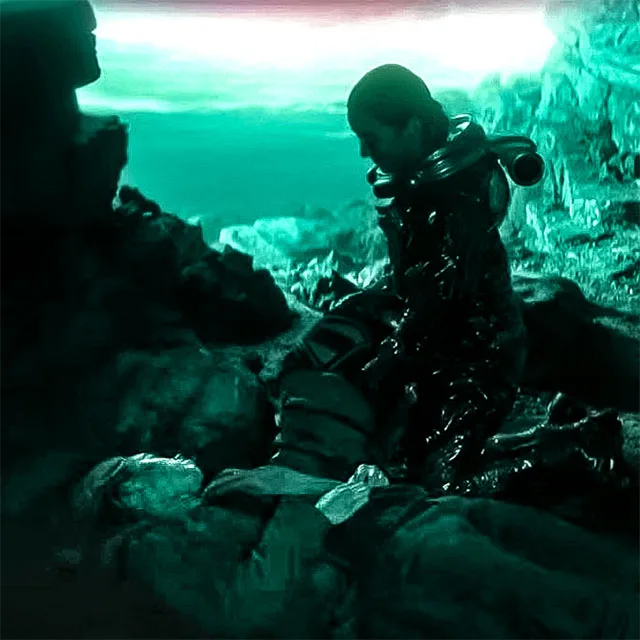 Supergirl 2026 scene: Kara Zor-El and Ruthye in dramatic green-lit rocky alien landscape under glowing green sun intense atmosphere – conservative alternative to Rotten Tomatoes anti-woke WOKE-O-METER rating & Christian family-friendly verdict exposing woke Hollywood agenda on WorthItOrWoke.com