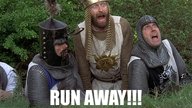 Monty Python and the Holy Grail 'Run Away!!!' scene with knights in armor from the classic comedy – used in review of The Odyssey 2026 movie – conservative alternative to Rotten Tomatoes anti-woke WOKE-O-METER rating & Christian family-friendly verdict exposing woke Hollywood agenda on WorthItOrWoke.com